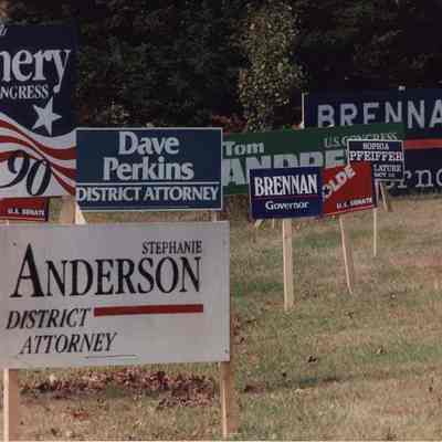 A photo view of roadside political signs. 9/26/1990.