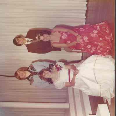 The queen and first runner-up with there escorts.