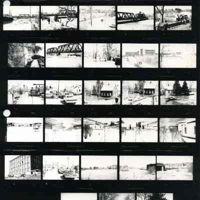 A sheet of small photos of the 1987 flood.