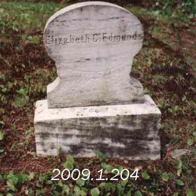 A photo of E Edmunds' gravestone.