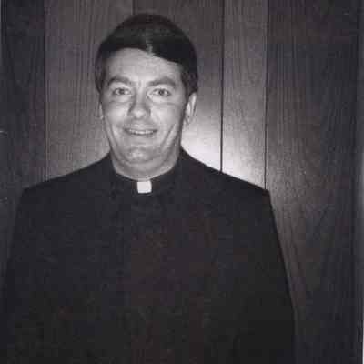 A photo view of Rev. John P. Helie. 8/3/1973.