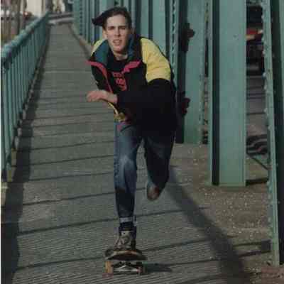 A photo view of a boy on a skateboard. 1/28/1992.