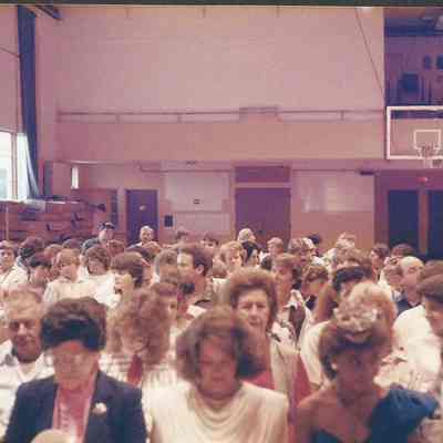 A color photograph of the audience prior to the start of the 25th Annual Brunswick Teen Queen
