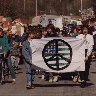 A photo view of marchers in a protest parade. 4/19/1990.