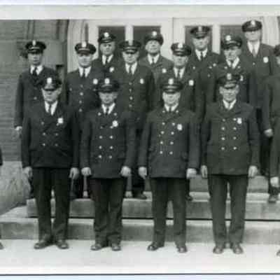 Fourteen Police Officers and the Chief