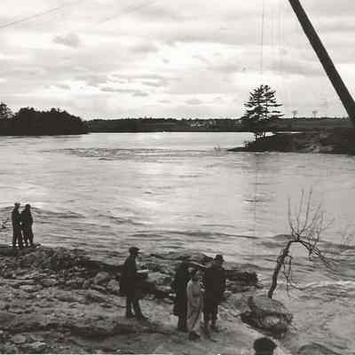 People on the Bank of the Androscoggin River