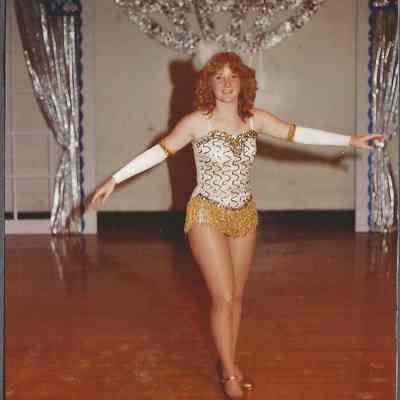 A color photograph of contestant #7 Anita Lashbrook