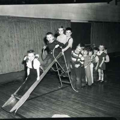 Children Sliding in the Rec. Center
