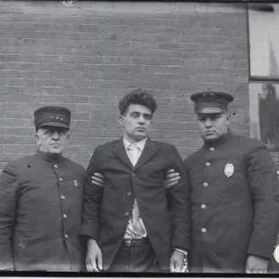 Police Chief Edwards and Officer Fournier With Unidentified Prisoner