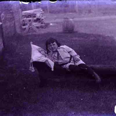 A child sitting. (very dark).