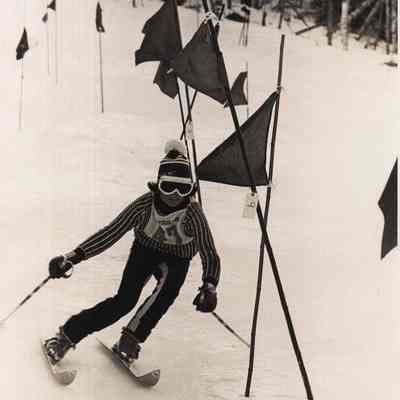 A photo view of Jimmy Ouellette skiing. 3/10/1976.
