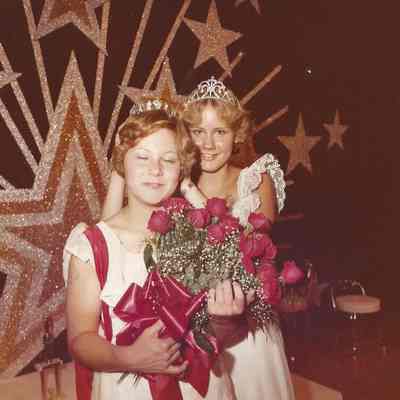 Becky Beck crowning the new Brunswick Teen Queen Shannon Crane