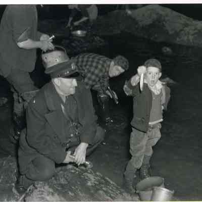 Boy Shows Off Smelt at Bunganuc
