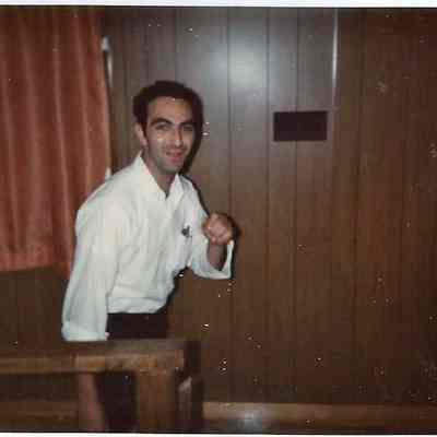 A color Polaroid photograph of a man.
