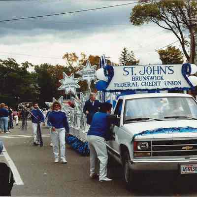 A color photograph of the St. John's Federal Credit Union float.