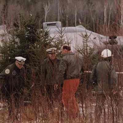 A photo view of a wrecked helicopter. 12/16/1988.
