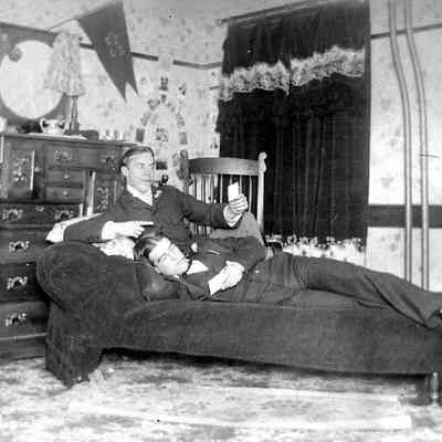 Two Unknown Men Laying