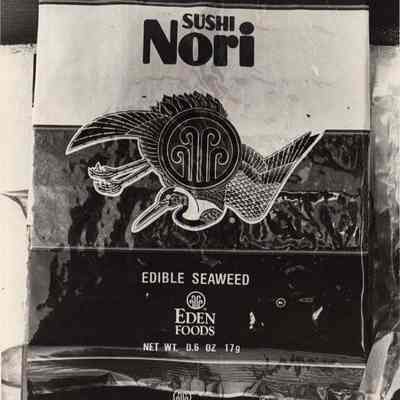A photo view of a sign for edible seaweed. 8/24/1992.