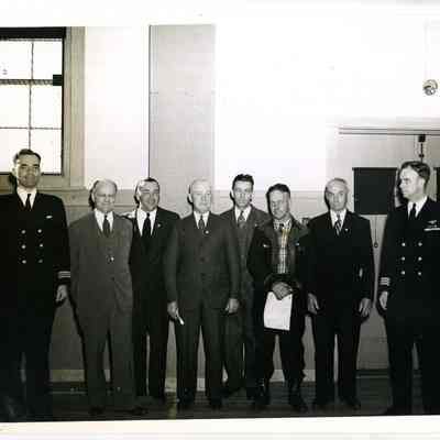 Two Officers and Six Civilians