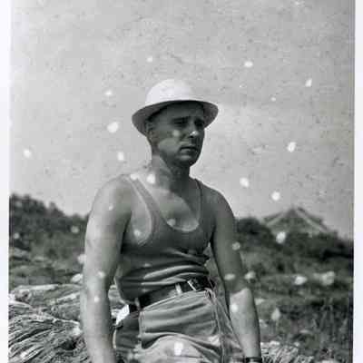 Man Sits on Bailey Island Shore