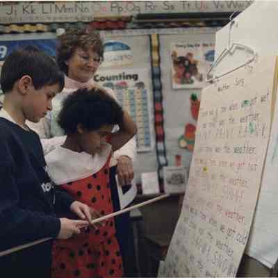 A photo view of children at the William Cone School. 4/17/1989.