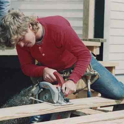 A photo view of a carpenter working at S. Harpswell. 4/27/1987.