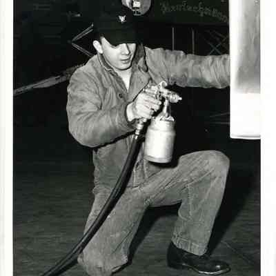 Navy Man Spraying