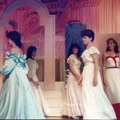 A color photograph of the contestants returning from a series of quater turns.