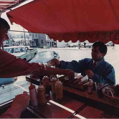 A photo view of a hot dog stand on the Mall. 5/8/1989.
