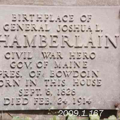 A photo of a plaque at Chamberlain's birth place.