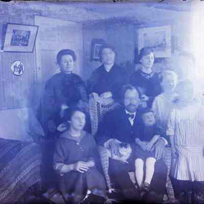 A group of people in a living room.