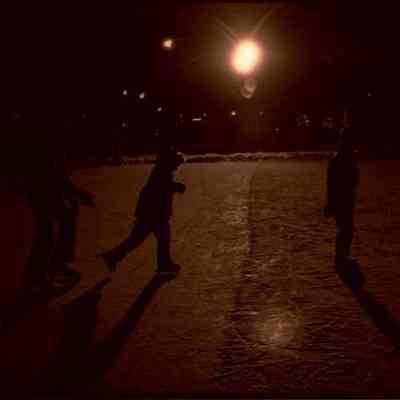 A photo view of night skating on the Mall. 12/31/1977.