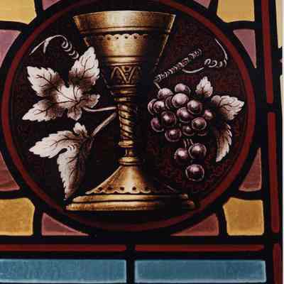 A photo view of a stained glass window. 6/20/1988.