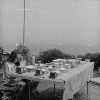 A photo view of people at the Interclub Regatta. 7/1970.