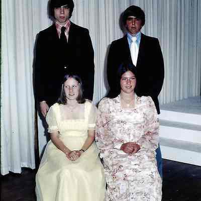 Two Contestants and Their Escorts