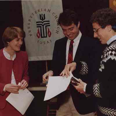 A photo view of three people. 4/29/1988.