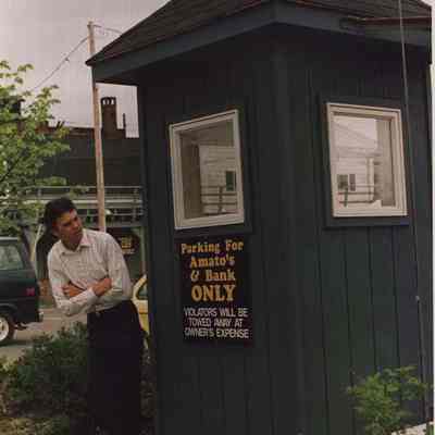 A photo view of a man near the entrance to Amato's. 5/20/1987.