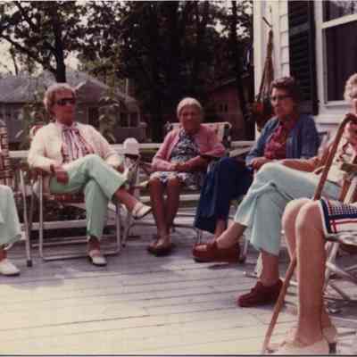 People Sitting on the Porch at the Stevens Home