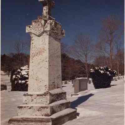 A photo view of a cemetery monument. 11/28/1989.