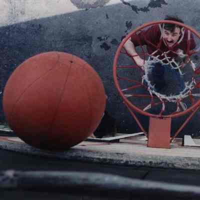 A photo view of a man throwing a basketball. 5/31/1989