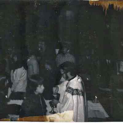 A B/W photograph of a church scene.