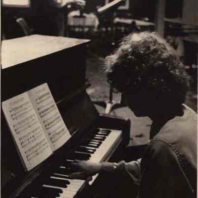 A photo view of Grace Carter on piano. 11/16/1981.