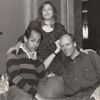 A photo view of three people. 9/10/1992.