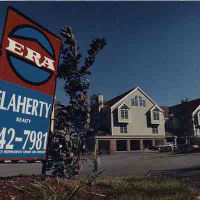 A photo view of a Flaherty Realty sign. 10/21/1989.