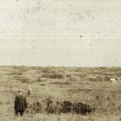 Two People in an Expansive Field