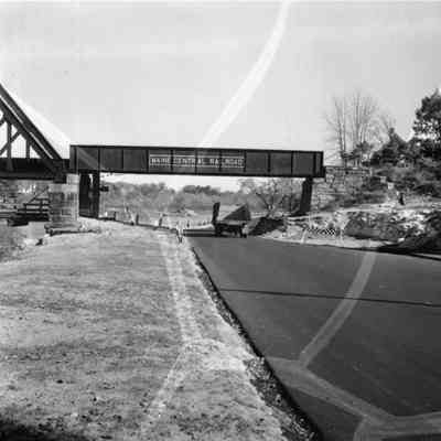 Truck Crosses Under Bridge