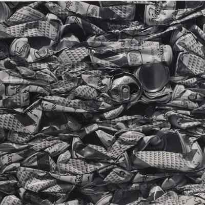 A photo view of crushed cans. 11/21/1979.