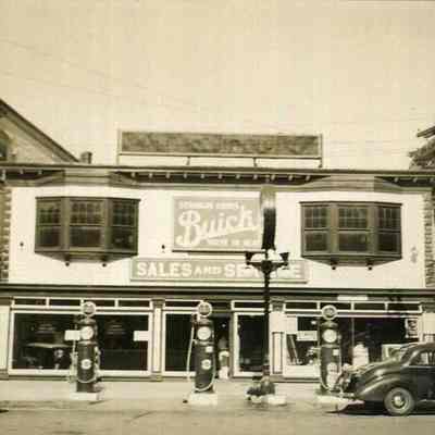 Stores at the corner of Maine and School Streets