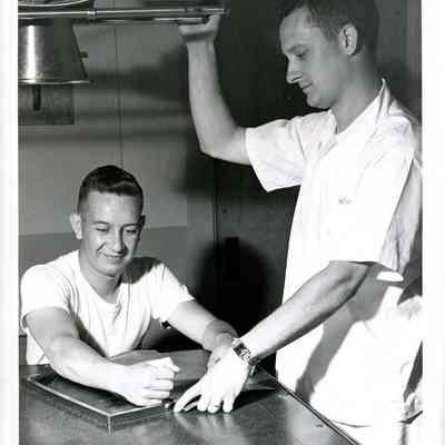 Roger Pelletier Demonstrates X-ray Equipment with Raymond Jellison