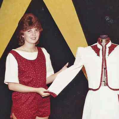 A color photograph of contestant # 5 Cheryl Benoit at rehearsal.